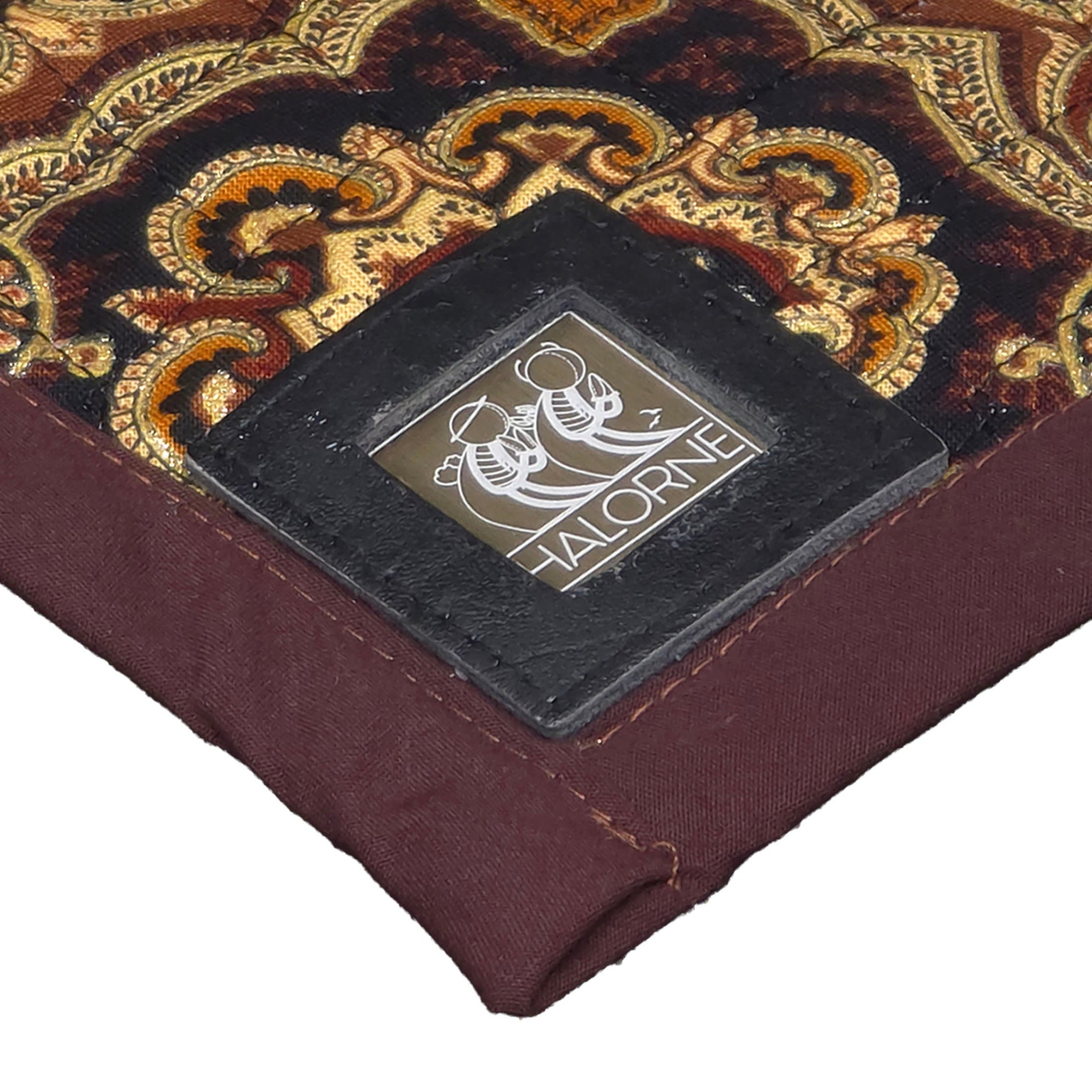 Close-up of a centrally placed logo on a bandana by Halorne Fold.